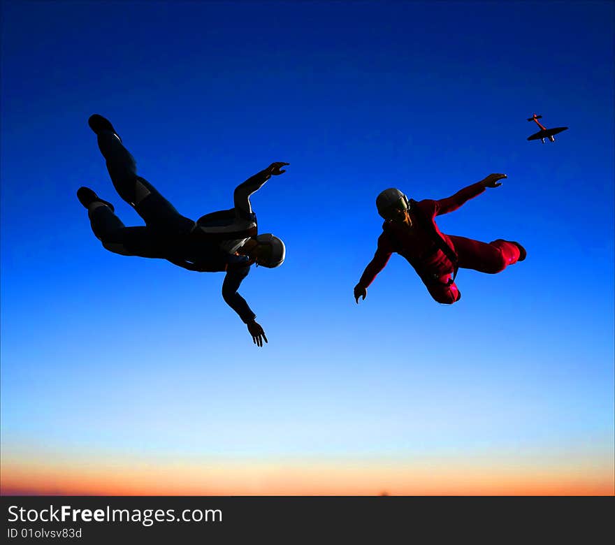 Sportsmen-parashutist soaring in sky