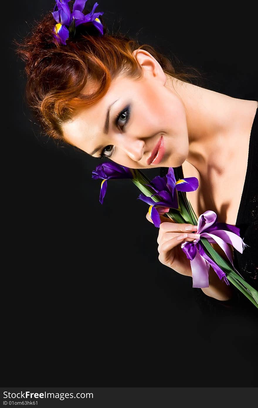 Red haired with flowers on black background