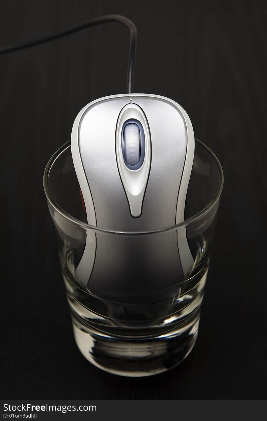 Computer Mouse In A Glass