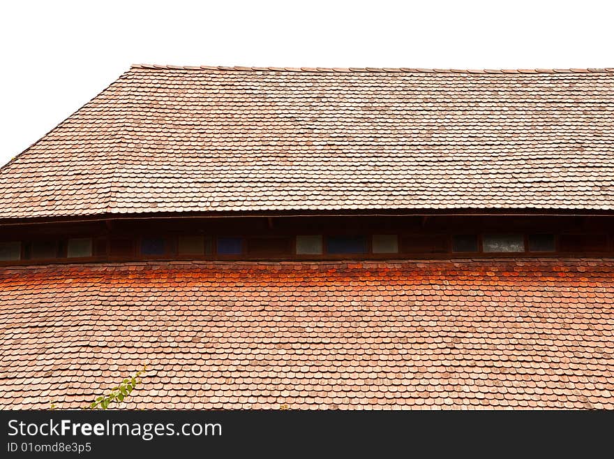 Roof of wood church in Yasothorn province, northeast of Thailand, all tiles made from wood pieces. Roof of wood church in Yasothorn province, northeast of Thailand, all tiles made from wood pieces