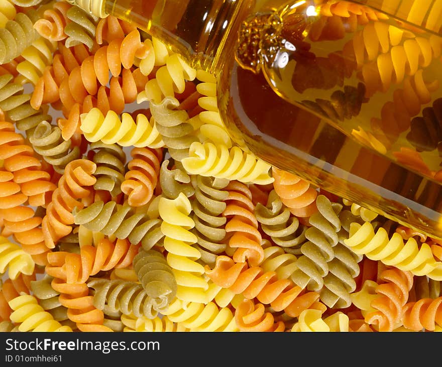 Italian pasta background with olive oil. food assortment