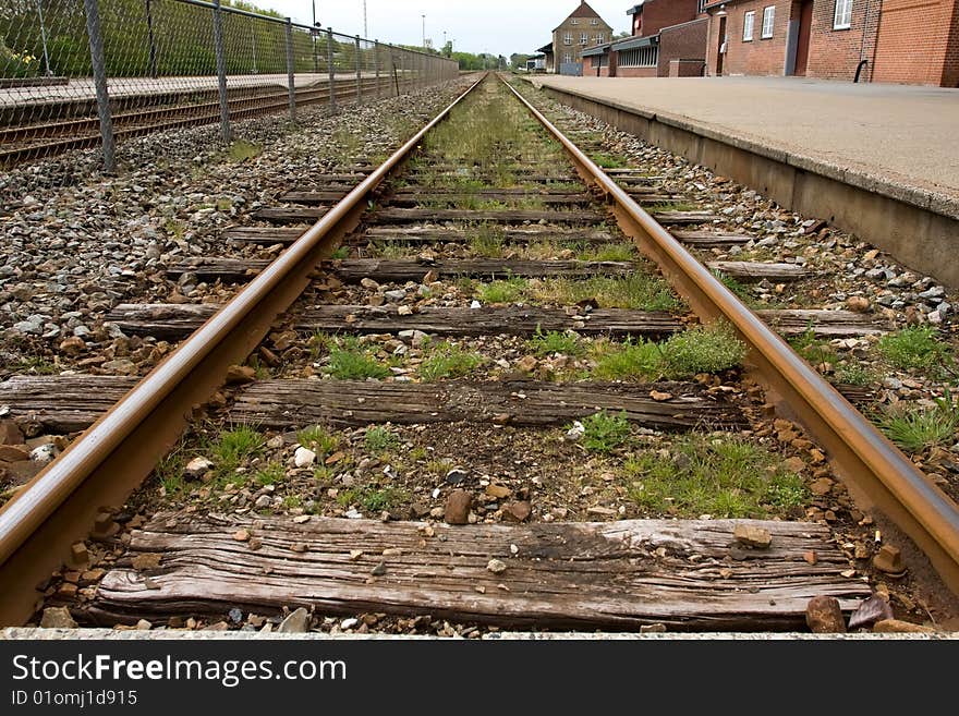 Railtrack starting form the station to the horizon.