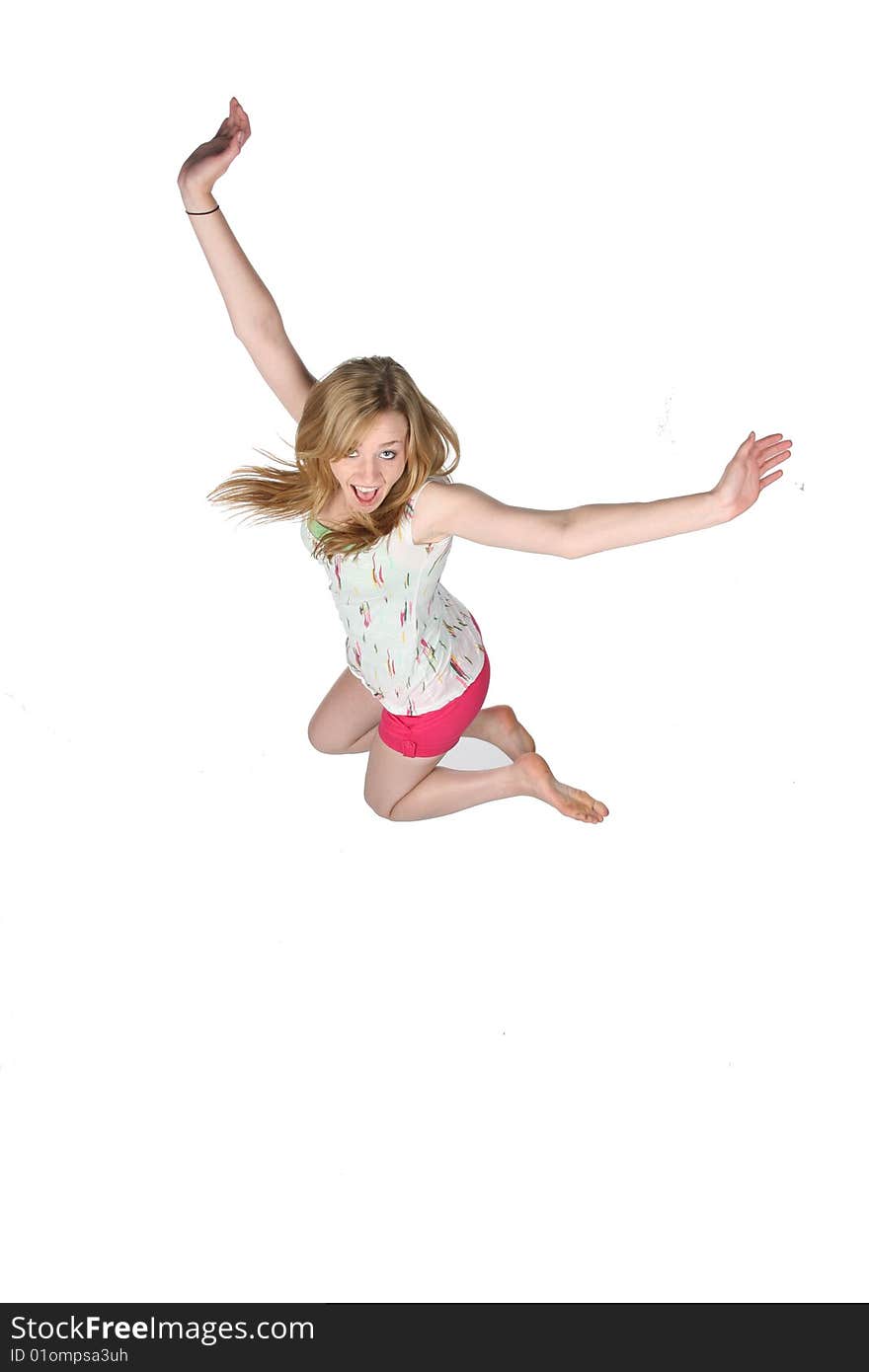 Pretty Young Woman Jumping For Joy And Fun