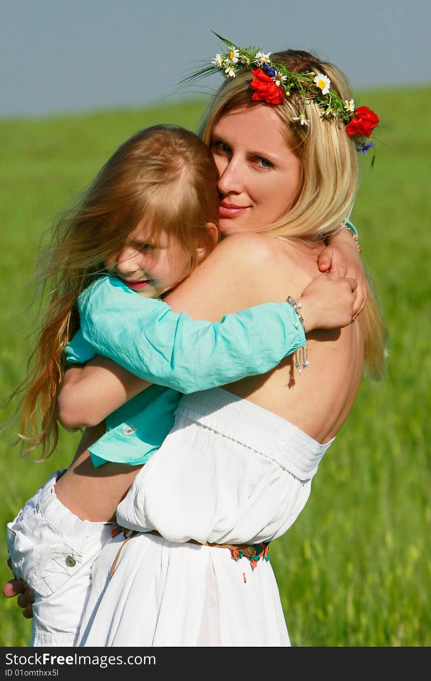 Mother and daughter on nature