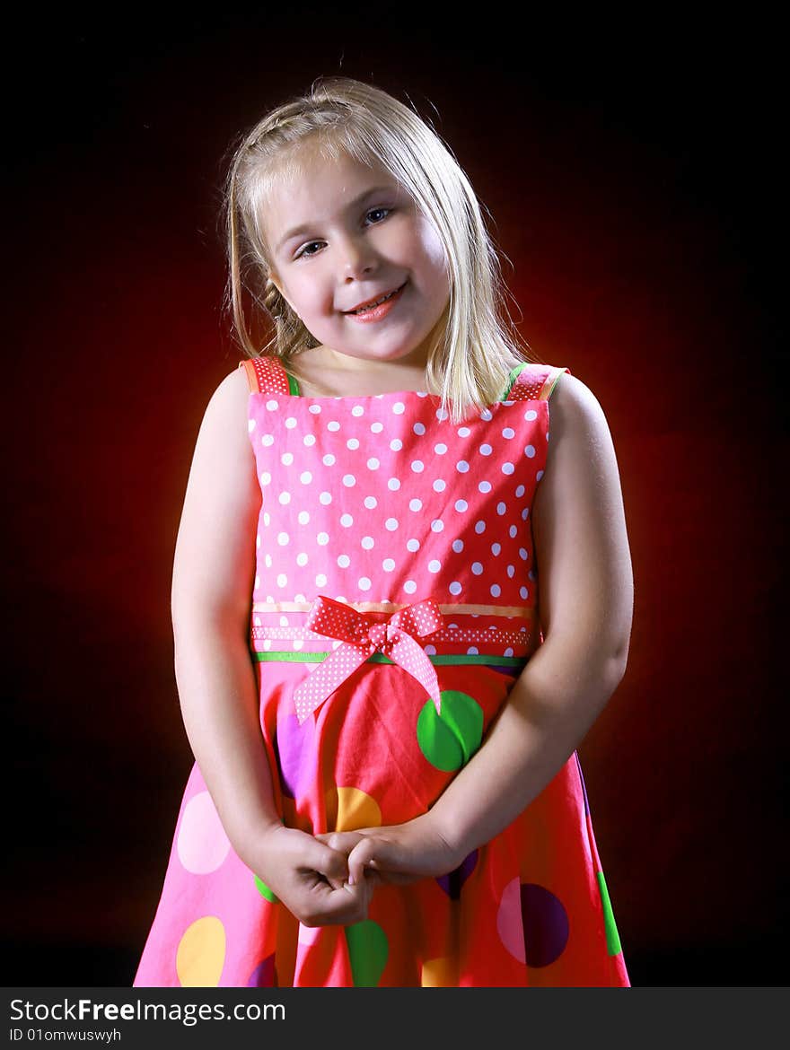 A childs portrait on a black background. A childs portrait on a black background