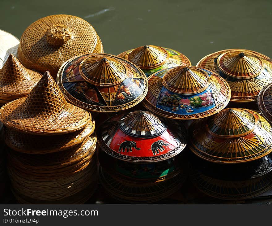 Hats stacked with water background. Hats stacked with water background