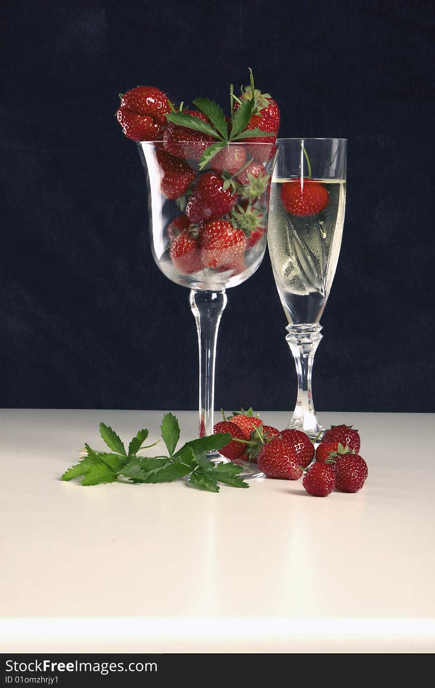 Strawberry and one Glass full of the champagne