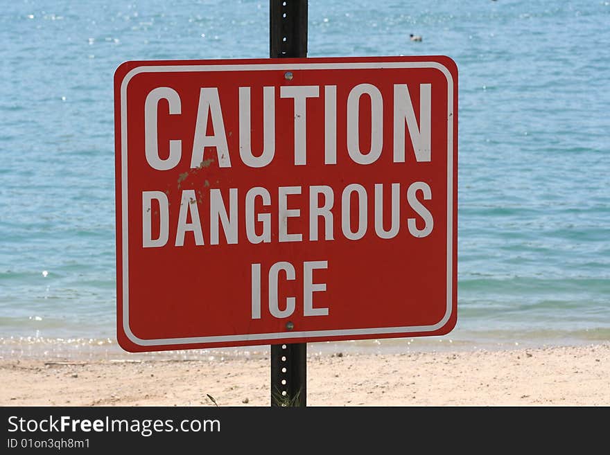 Image of a caution sign warning of dangerous ice