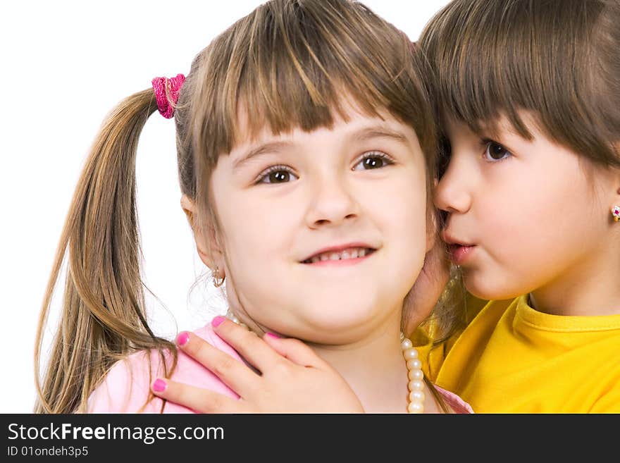 Two happy little girls on white background. Two happy little girls on white background