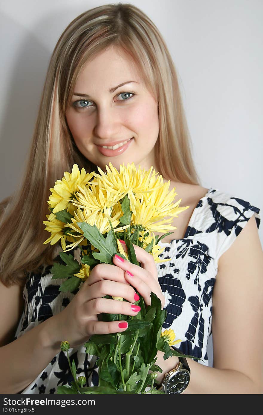 Happy young smiling woman with bunch of flowers. Happy young smiling woman with bunch of flowers