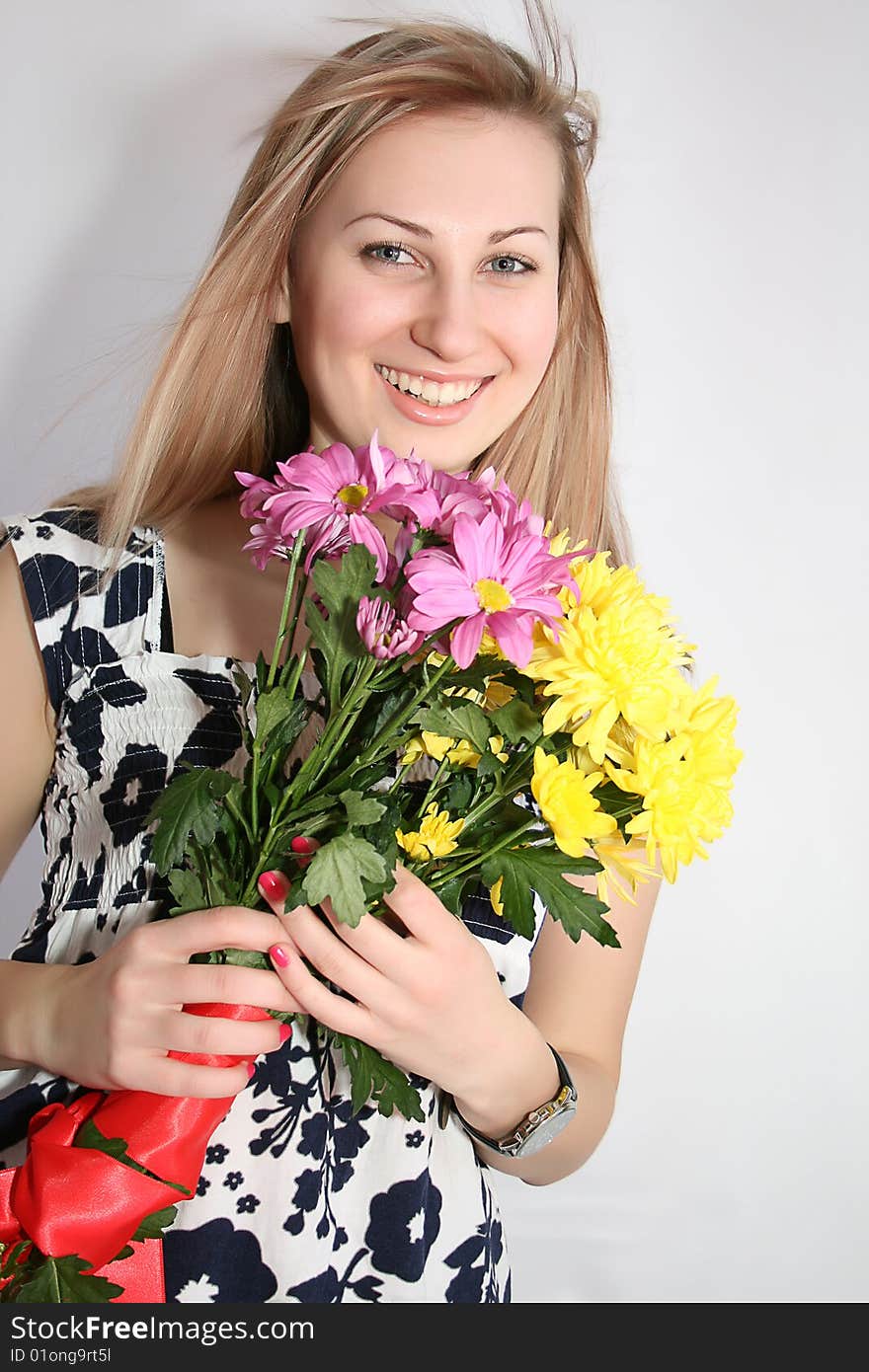 Happy young smiling woman with bunch of flowers. Happy young smiling woman with bunch of flowers