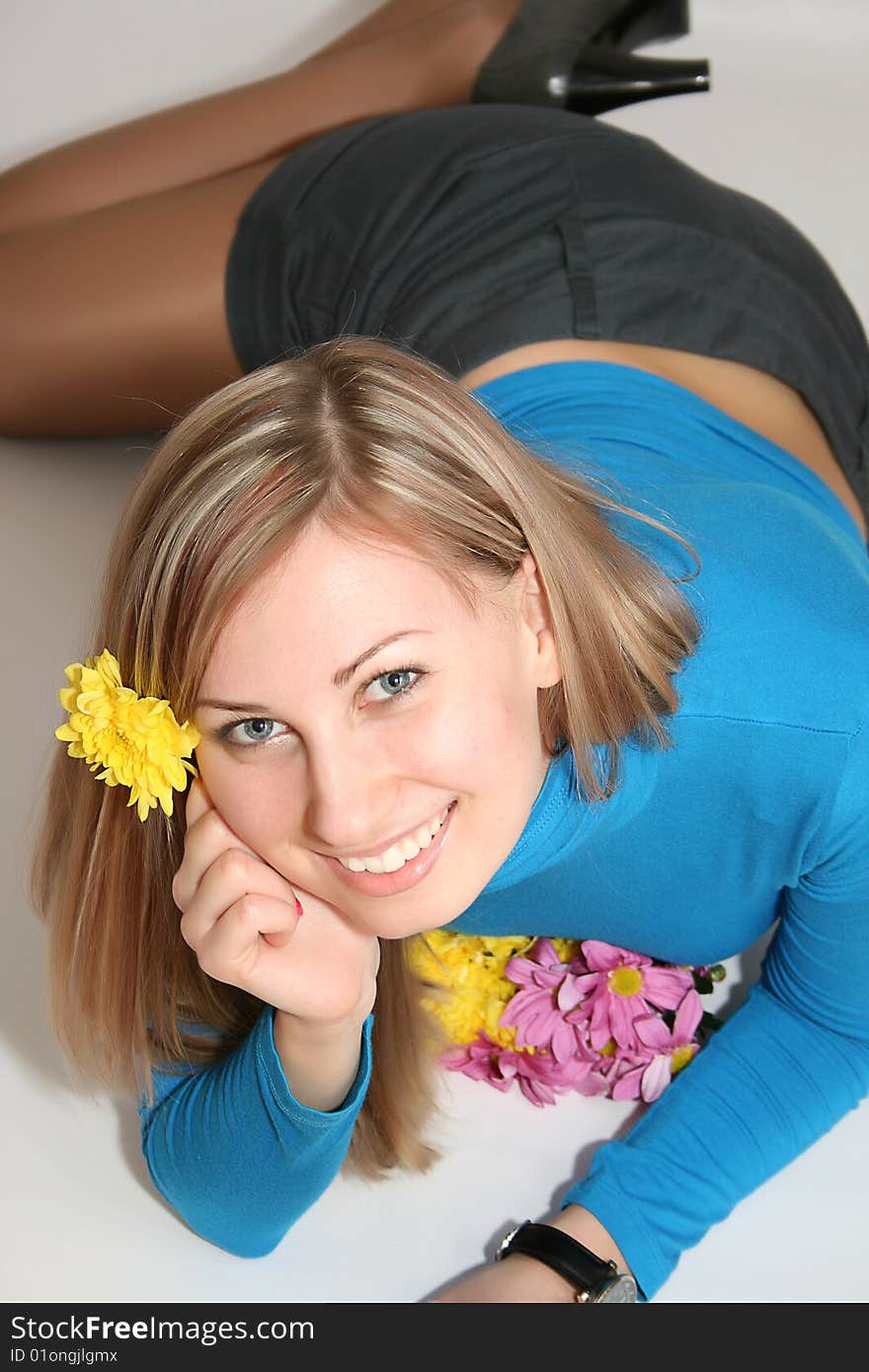 Happy young smiling woman with bunch of flowers. Happy young smiling woman with bunch of flowers