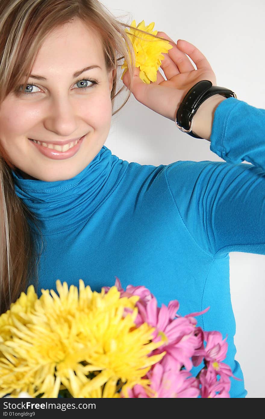 Happy young smiling woman with bunch of flowers. Happy young smiling woman with bunch of flowers