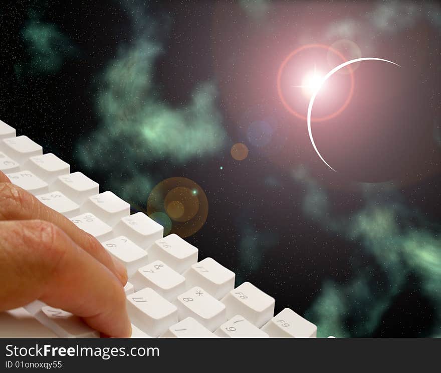 Male using keyboard overlaid over space scene. Male using keyboard overlaid over space scene