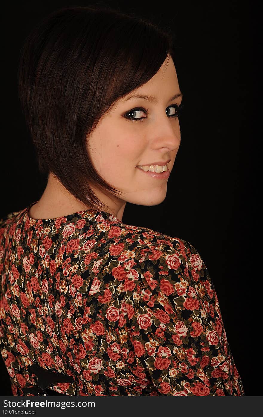 Pretty teenage woman on black background. Pretty teenage woman on black background