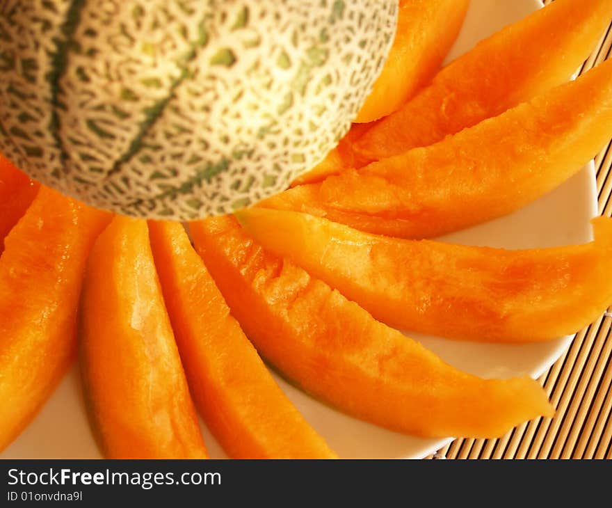 Slices of Melon on a plate. Slices of Melon on a plate