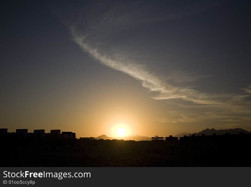 Orange sunset in the mountains. Egypt, Cairo