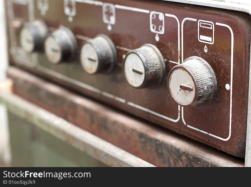 Switches of old rusty gas cooker. Switches of old rusty gas cooker