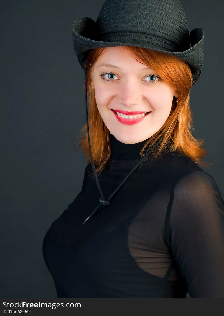 red young woman wearing a cowboy hat. red young woman wearing a cowboy hat