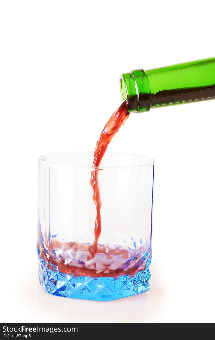 Red Wine Pouring Into Glass