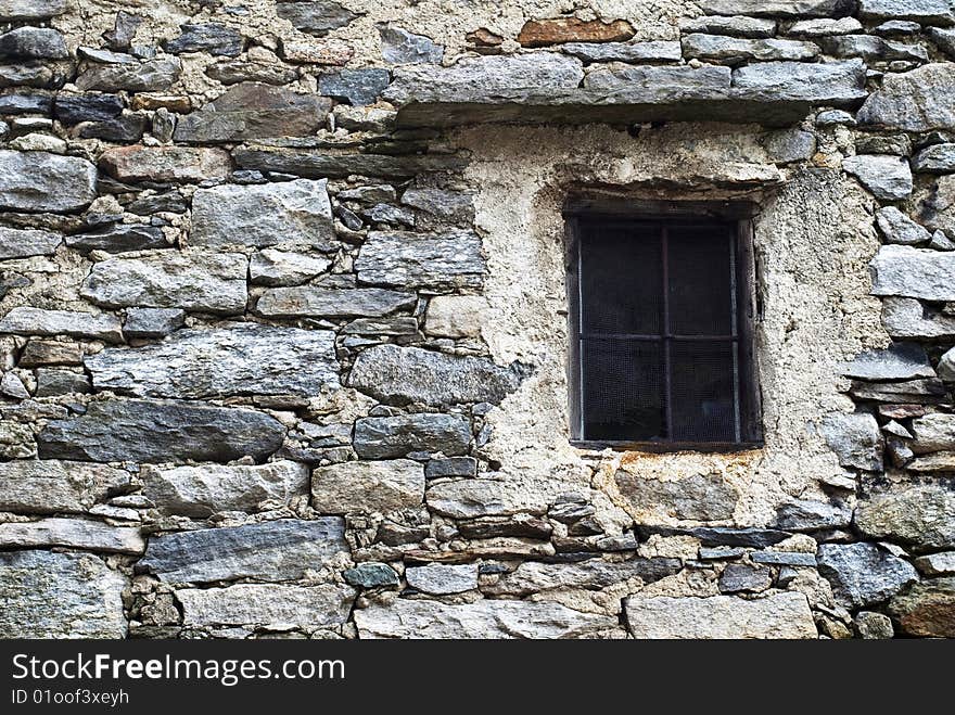 Old window in an italian mountain hut. Old window in an italian mountain hut