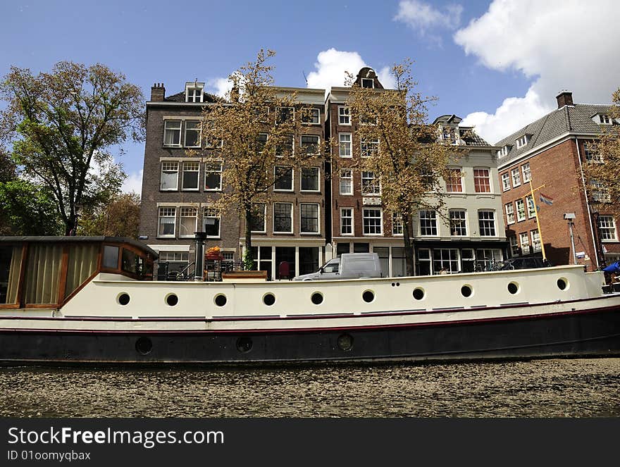 Building and boat on canal