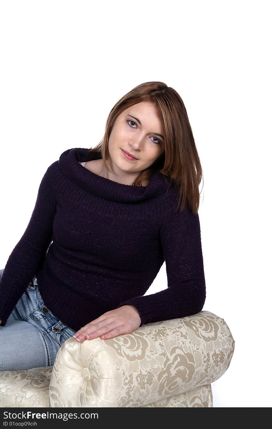 Pretty teen with black sparkling sweater on bench