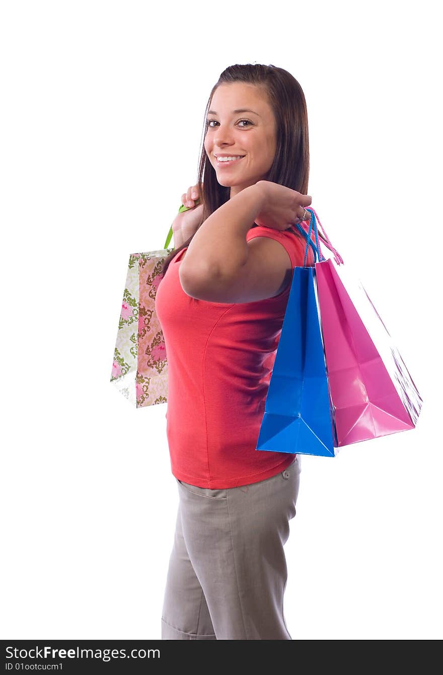 Woman holding shopping bags isolated on white