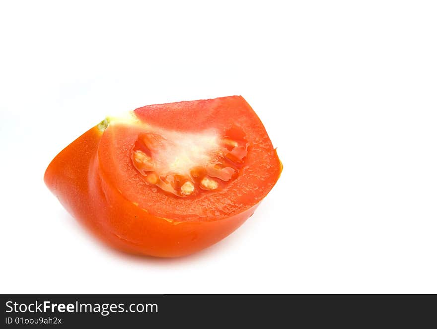 Piece of chopped tomato isolated on white background. Piece of chopped tomato isolated on white background