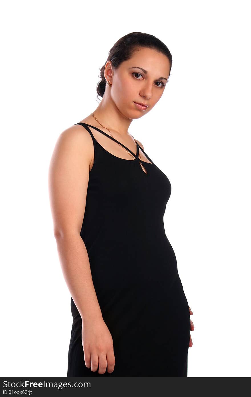 Girl in black dress posing isolated