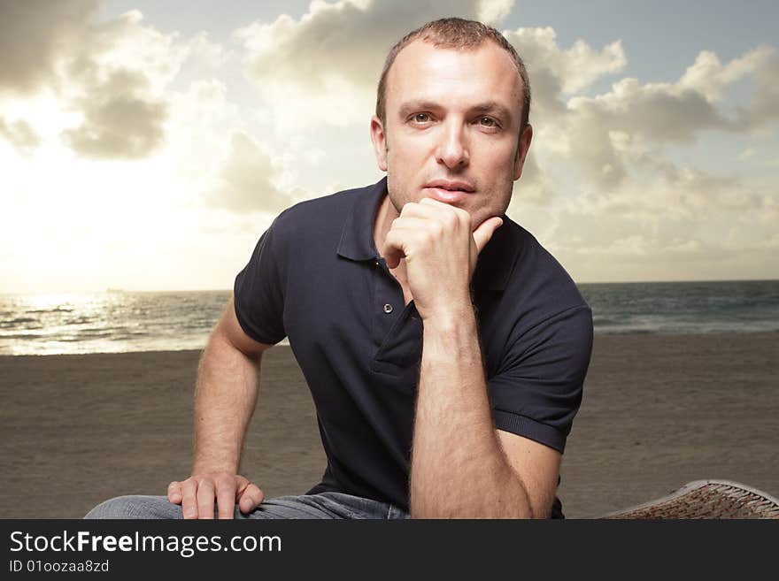 Handsome young man on the beach