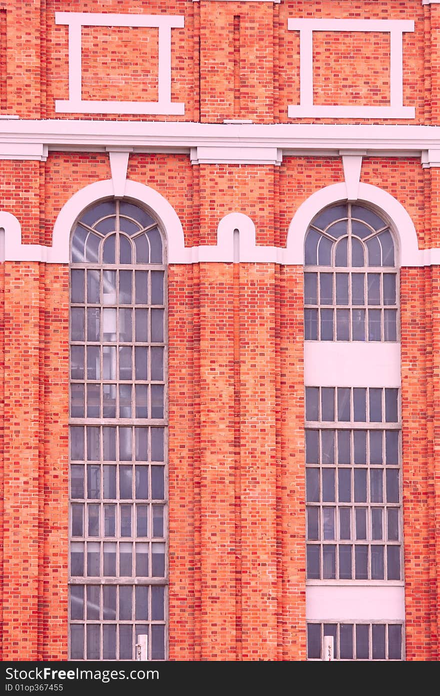 Building of antique factory with chimney