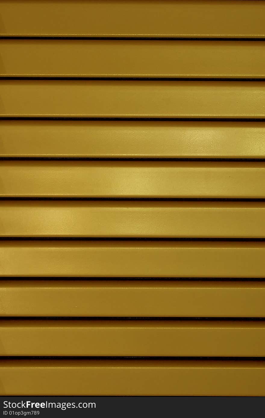 Yellow stripes texture of metal window shield.