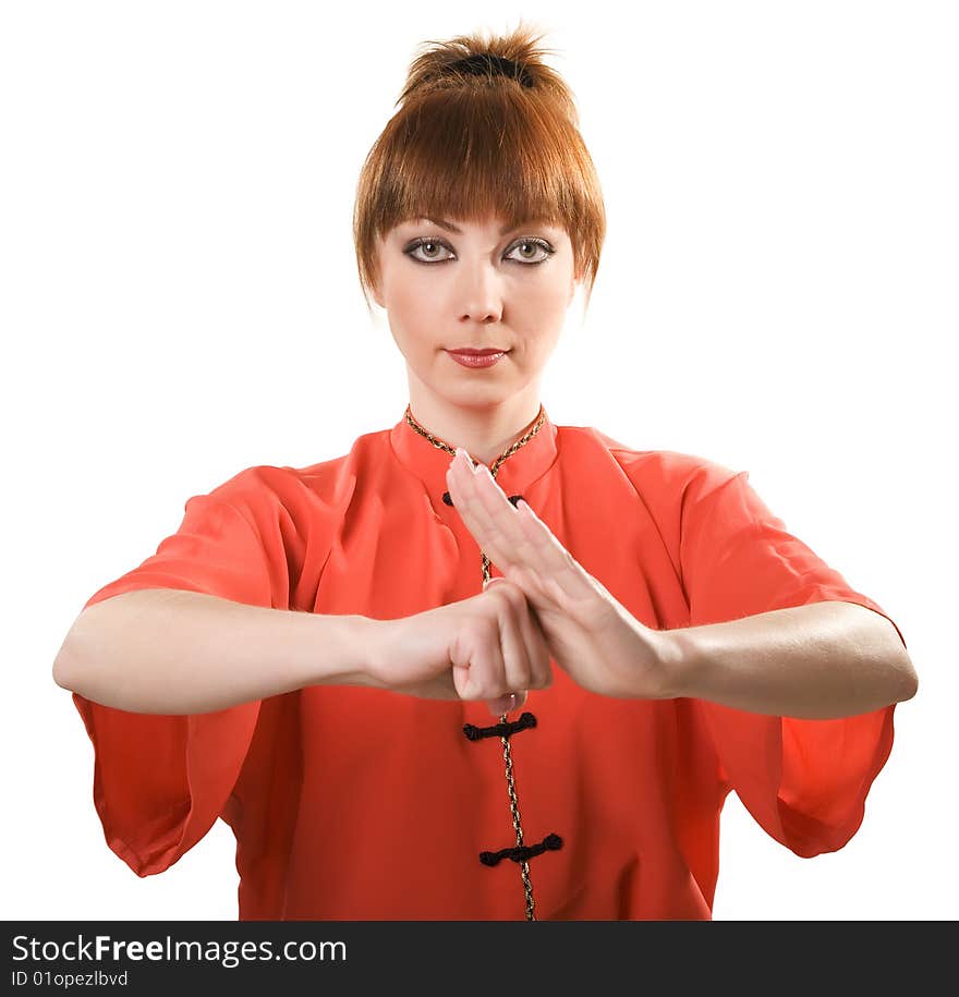 Young woman makes chinese greeting gesture isolated with clipping path on white background