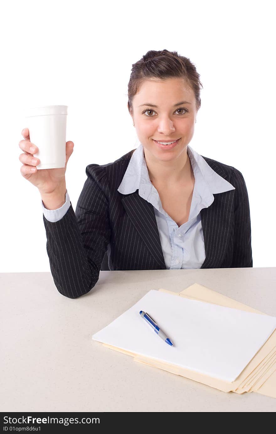 Business woman having her morning coffee