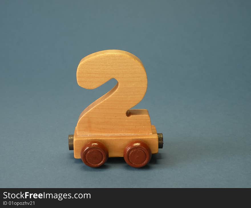 Wooden rating train, part , blue background. Wooden rating train, part , blue background