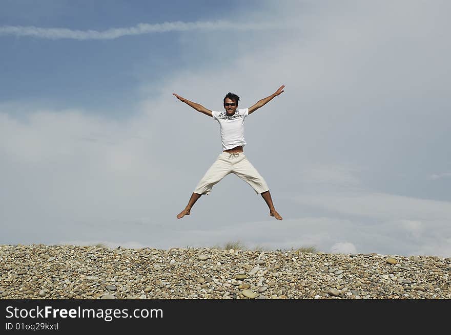 Man jumping on the beach