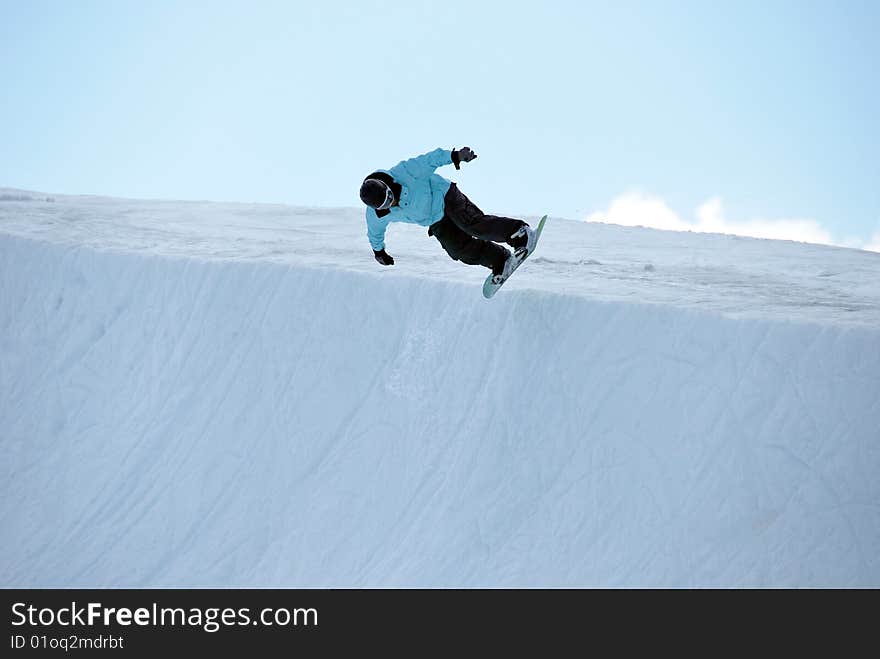 Snowboarder In Half Pipe