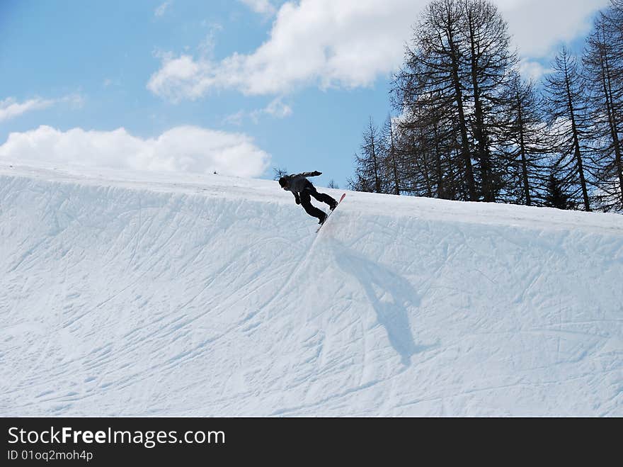 Snowboarder In Half Pipe