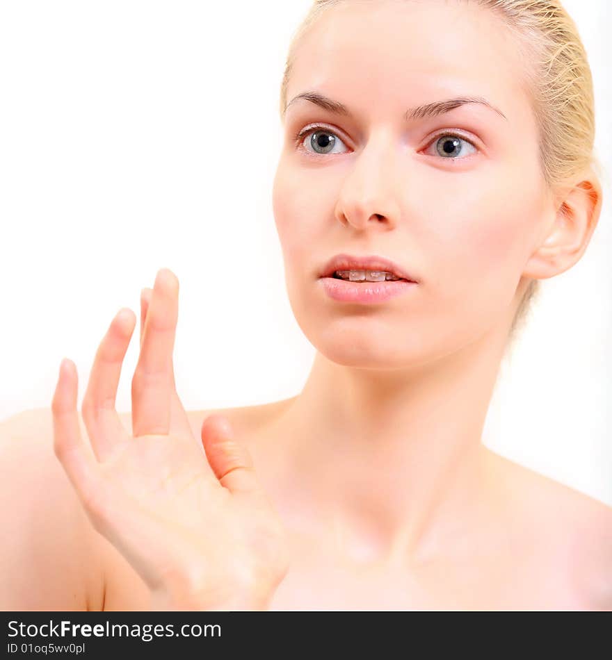 Portrait of the young beautiful woman close up