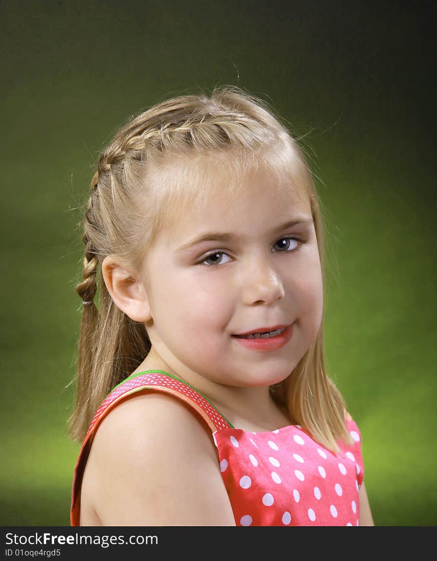 A childs portrait on a black background. A childs portrait on a black background