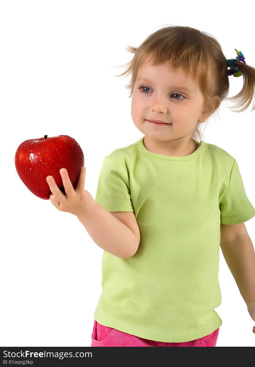 Little girl with red apple isolated on white background