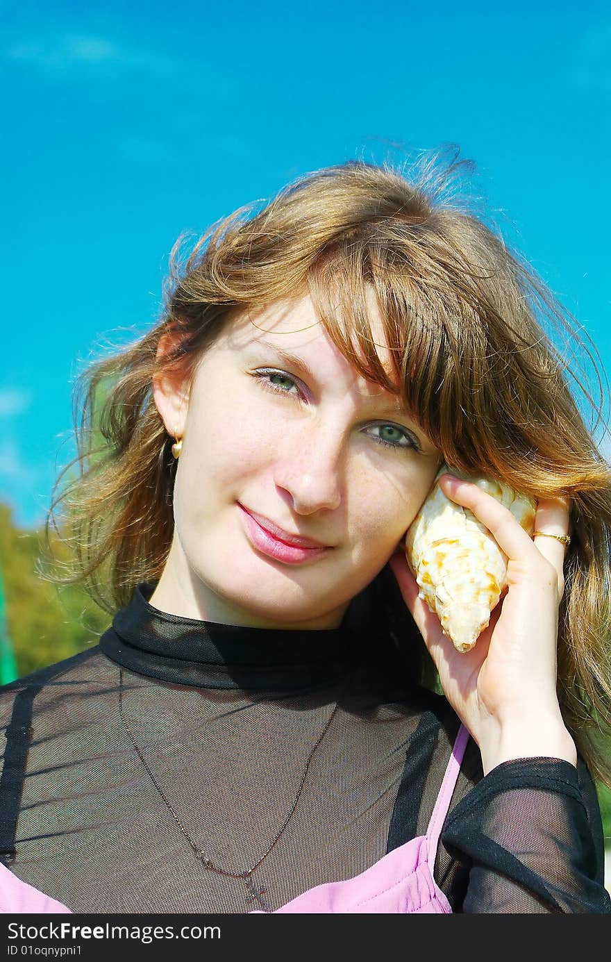 Girl Hears The Sounds Of Sea