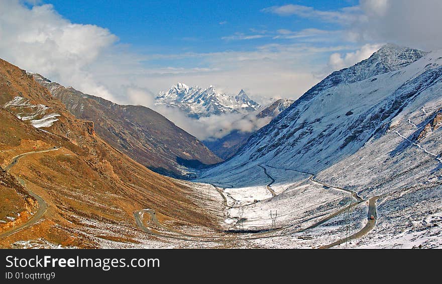 The photo was taken in the Balang Mountain. Cross Balang mountain, Chengdu Campagna will been arrived. The Siguniang Mountain (Four Girls Mountain) lies between Xiaojin County and Wenchuan County of the Aba Tibetan and Qiang Autonomous Prefecture, Sichuan Province China. It makes the highest peak of the Qionglai Mountain Range at eastern end of Hengduan Mountains. The Siguniang Mountain consists of four continuous peaks in a range of 3.5 km from north to south, rising at 6,250 meters, 5,664 meters, 5,454 meters and 5,355 meters above sea level respectively. The four peaks are covered with snow all year round, just like four gracious girls wearing white gauze scarves. Among them, the Yaomei Peak (the peak of the youngest girl) is the highest and the most beautiful. The photo was taken in the Balang Mountain. Cross Balang mountain, Chengdu Campagna will been arrived. The Siguniang Mountain (Four Girls Mountain) lies between Xiaojin County and Wenchuan County of the Aba Tibetan and Qiang Autonomous Prefecture, Sichuan Province China. It makes the highest peak of the Qionglai Mountain Range at eastern end of Hengduan Mountains. The Siguniang Mountain consists of four continuous peaks in a range of 3.5 km from north to south, rising at 6,250 meters, 5,664 meters, 5,454 meters and 5,355 meters above sea level respectively. The four peaks are covered with snow all year round, just like four gracious girls wearing white gauze scarves. Among them, the Yaomei Peak (the peak of the youngest girl) is the highest and the most beautiful.