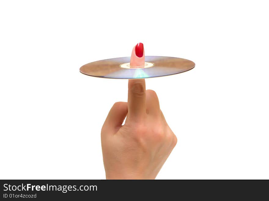 Female hand holds a disk on a white background