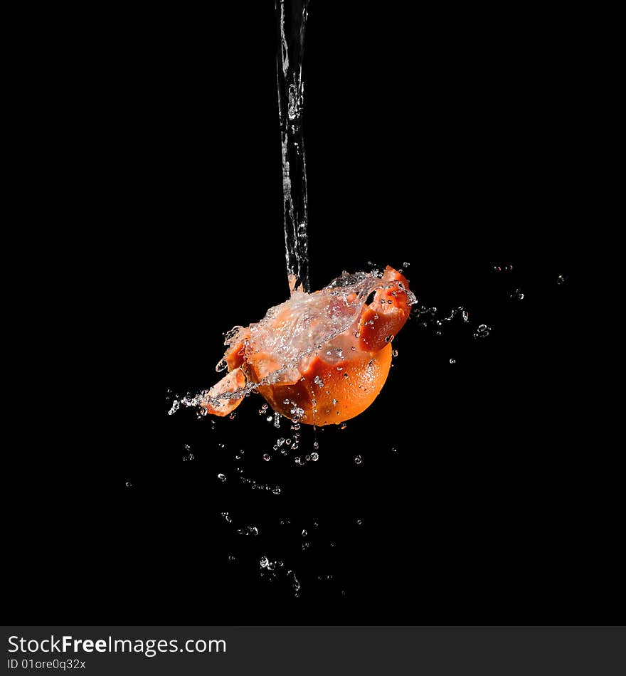 Grapefruit splashed with water