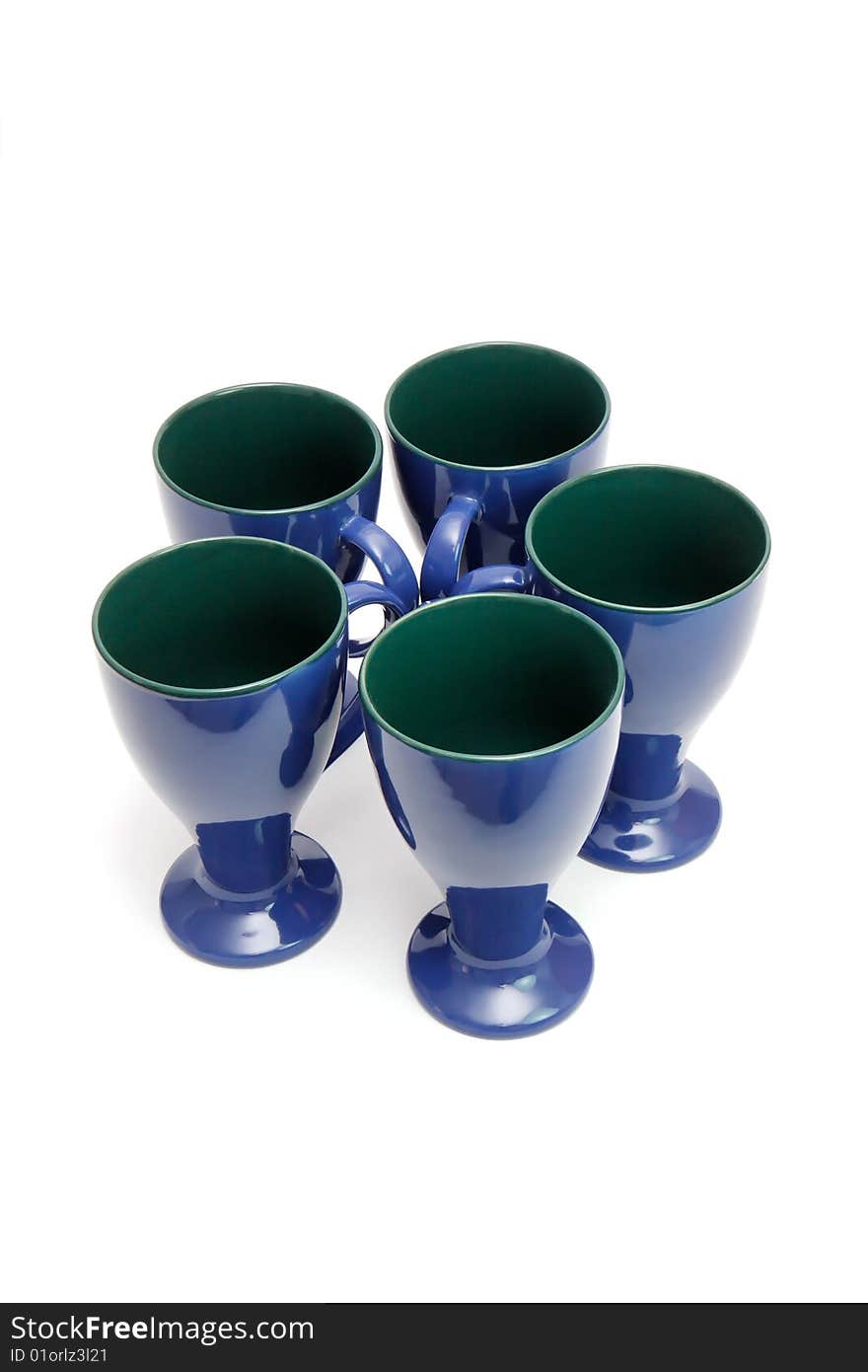 Circle of five blue long-stemmed coffee cups isolated. Circle of five blue long-stemmed coffee cups isolated