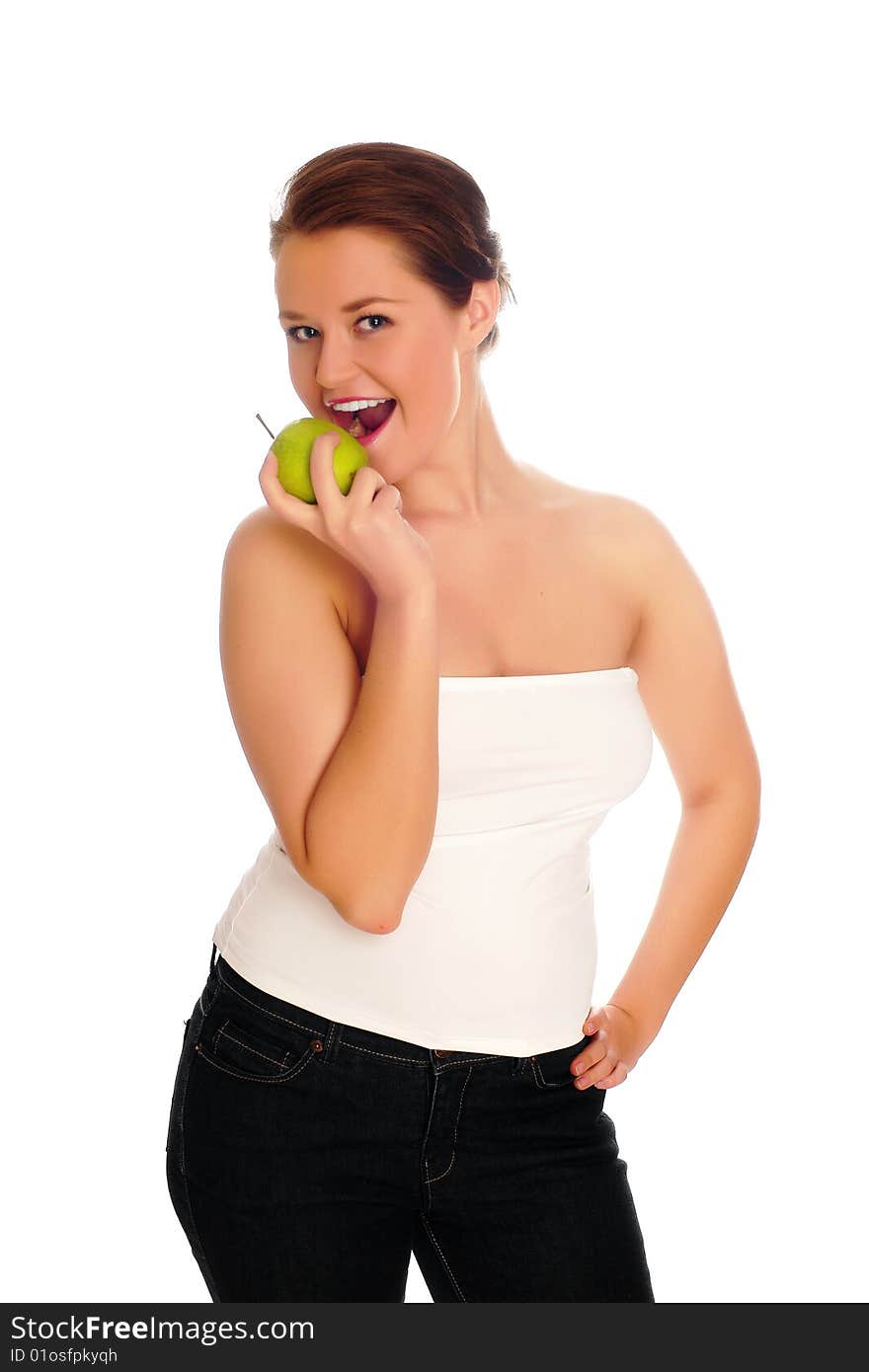 Young woman eating apple and smile over white background