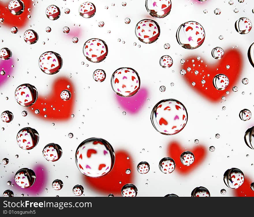 Dripped on glass varicoloured.Abstract textured background.Saint Valentin. Dripped on glass varicoloured.Abstract textured background.Saint Valentin