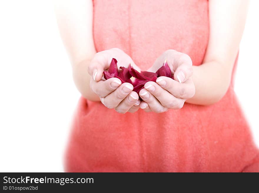 A young body keep in hands a petals of flowers. A young body keep in hands a petals of flowers